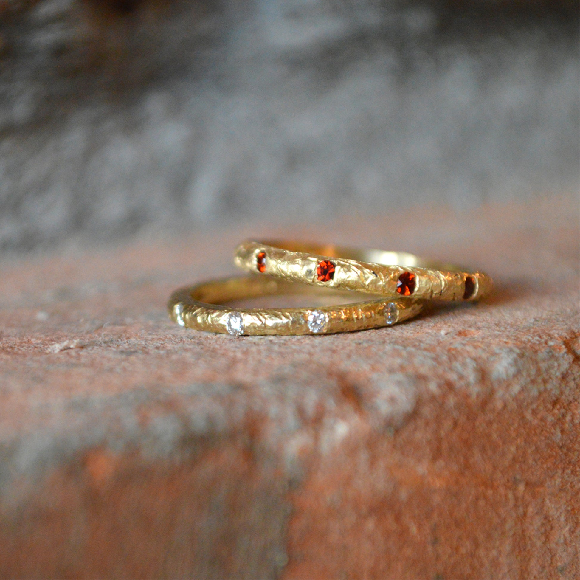 La Rioja Garnet Ring and Diamond Ring on Brick