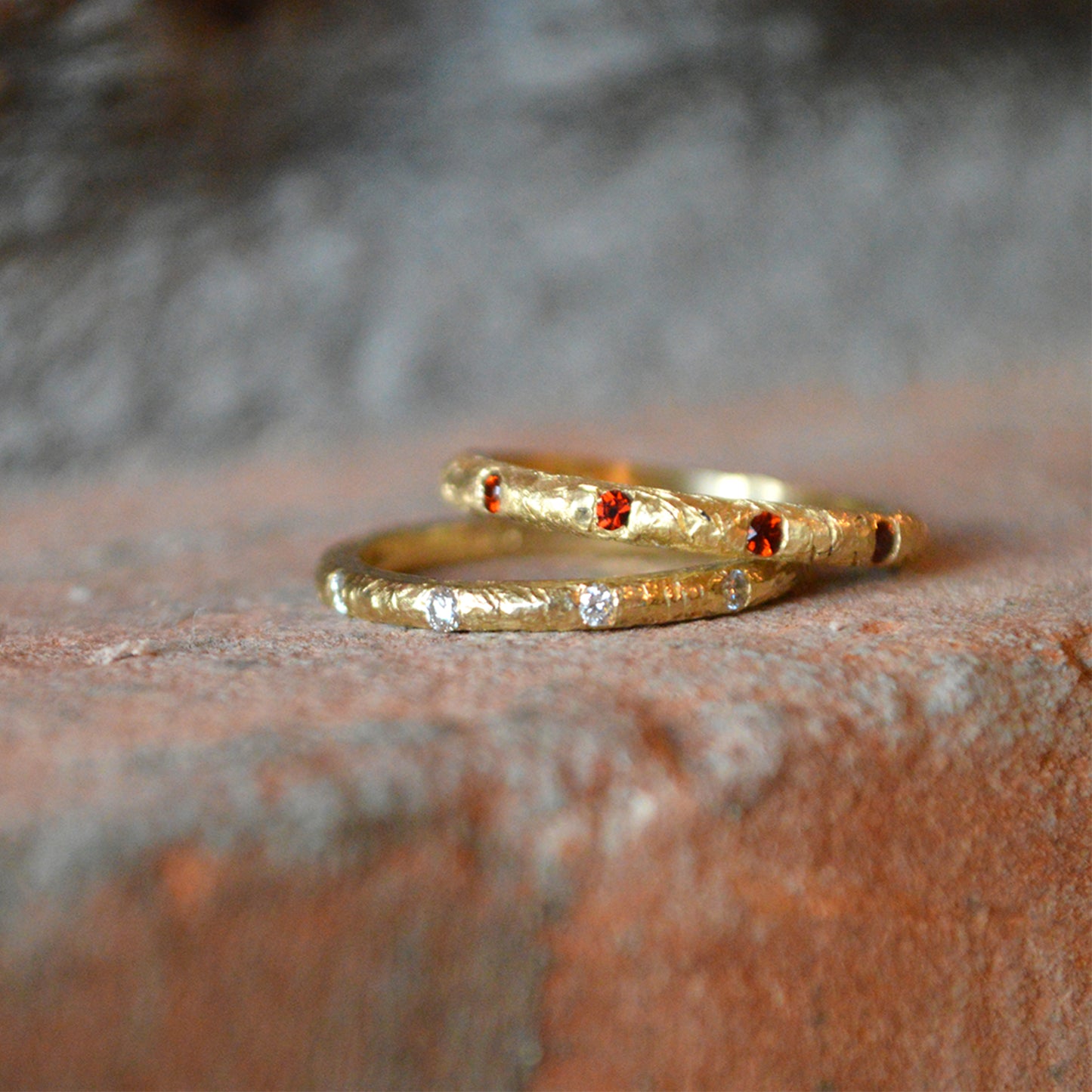 La Rioja Garnet Ring and Diamond Ring on Brick